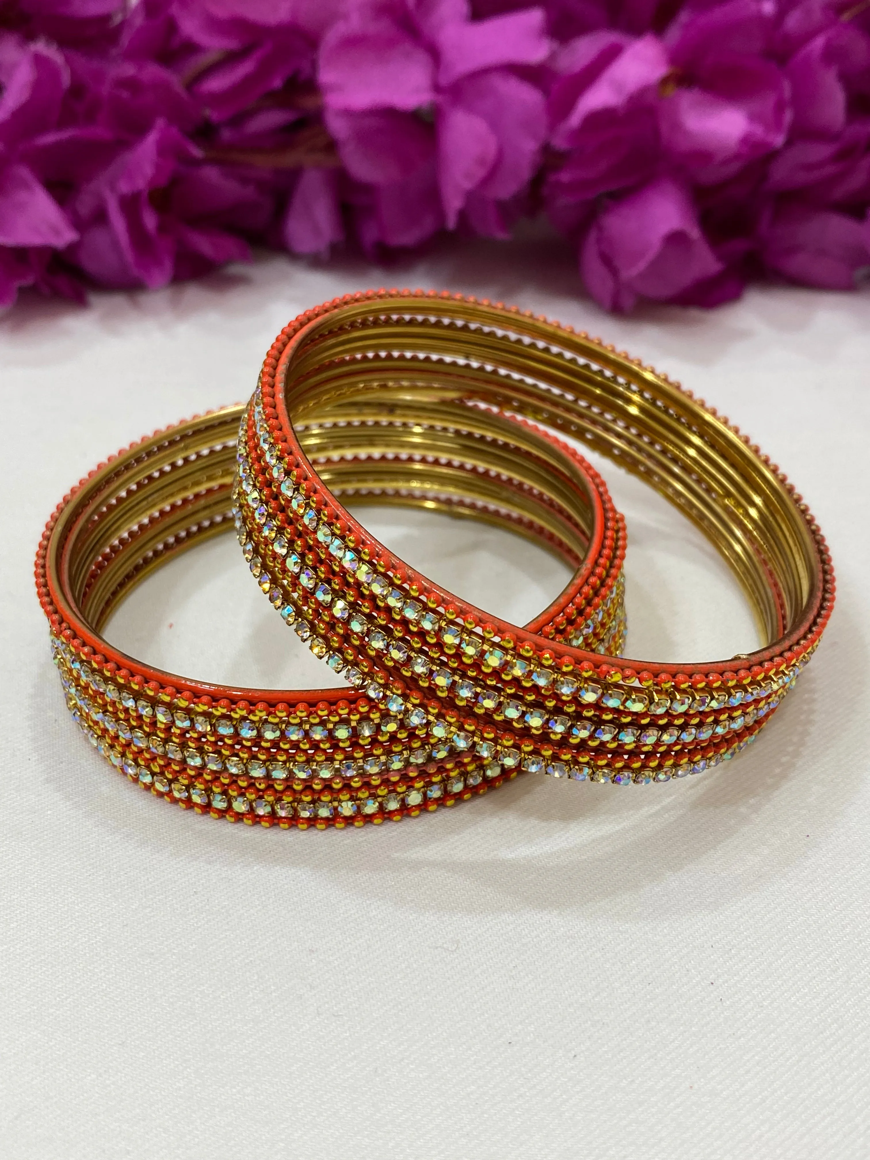 Alluring Orange Color Bangles With Flashing White Stone For Women