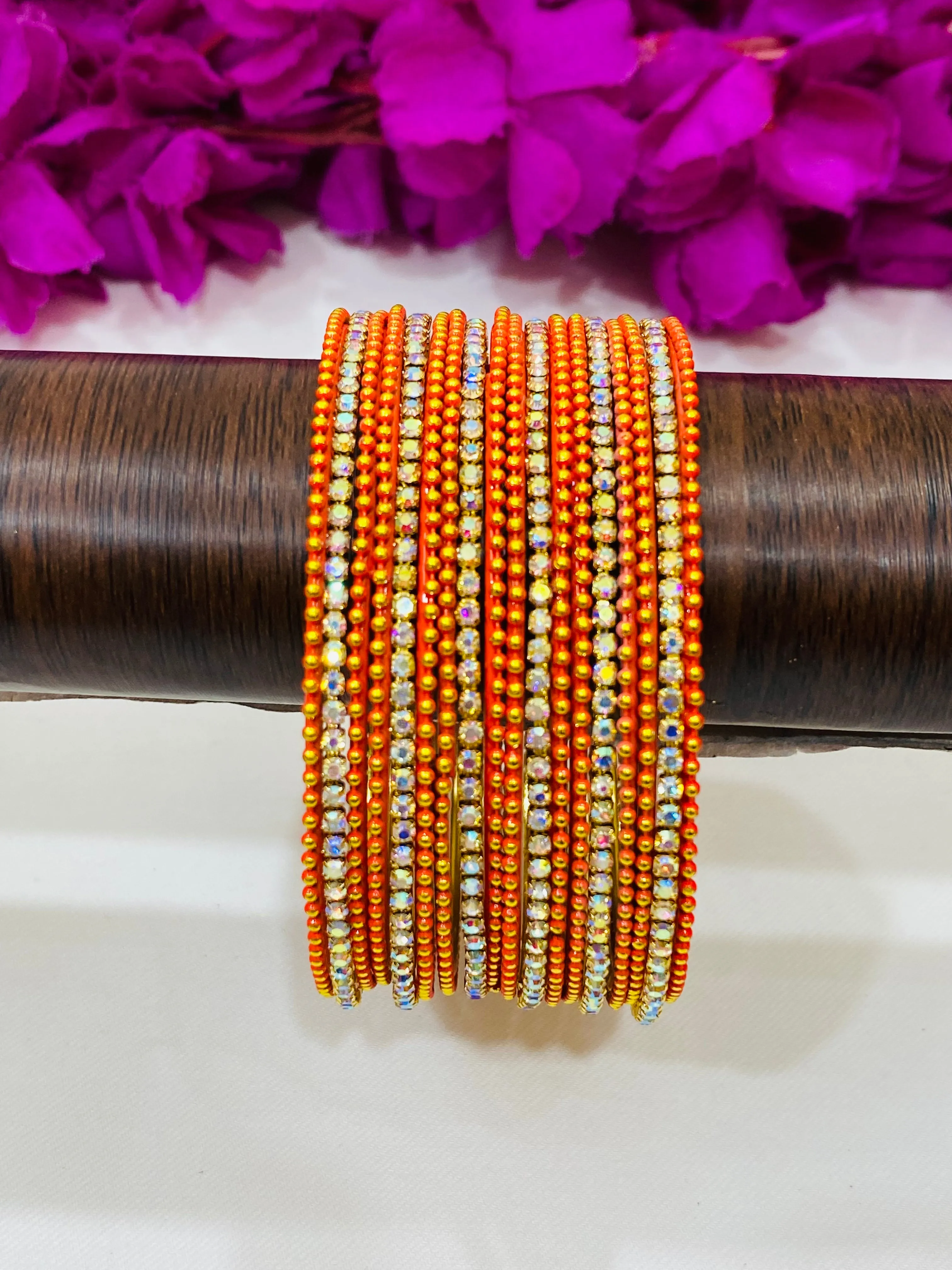 Alluring Orange Color Bangles With Flashing White Stone For Women