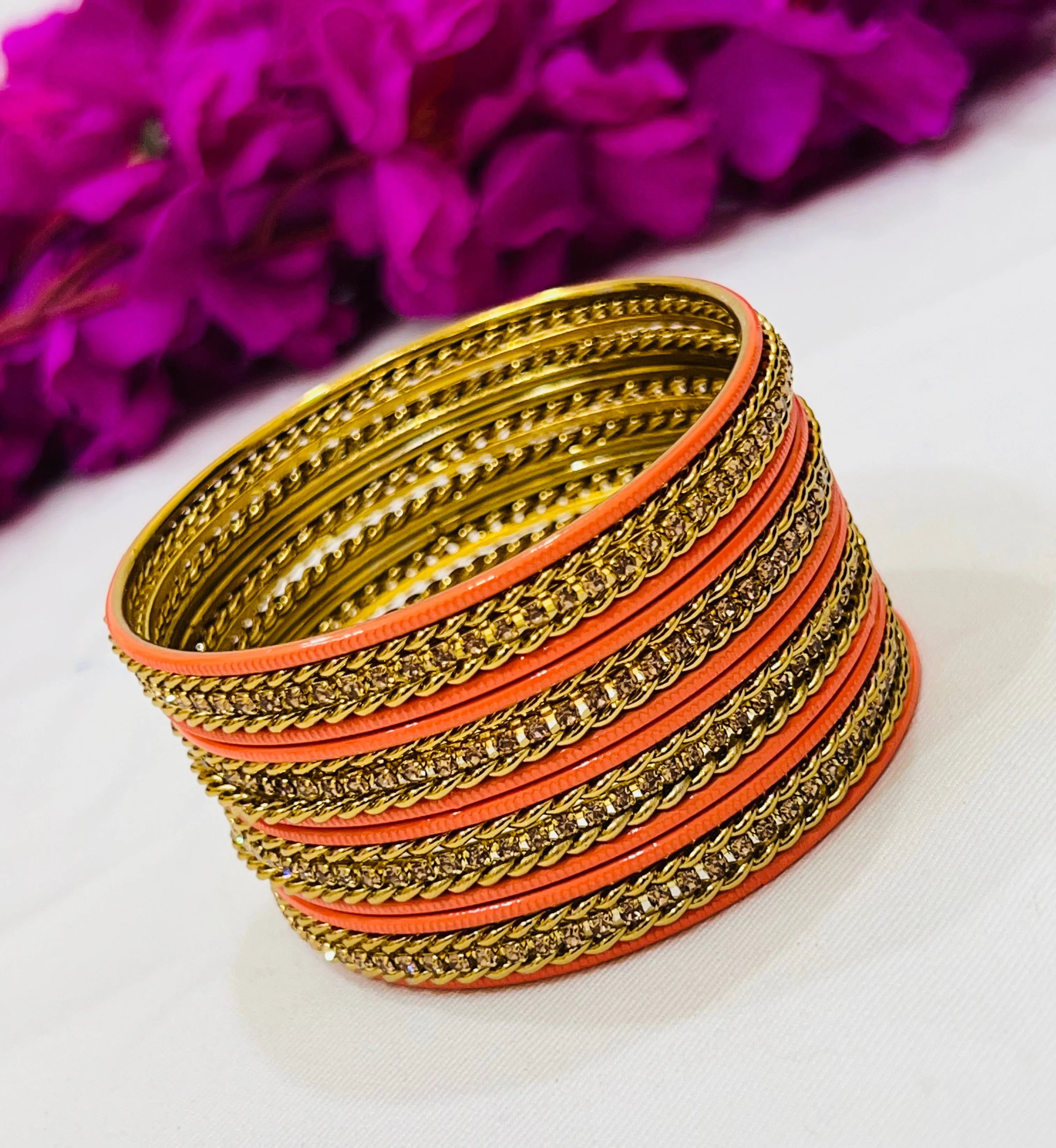 Appealing Orange Color Metal Bangles With Stone Work For Women