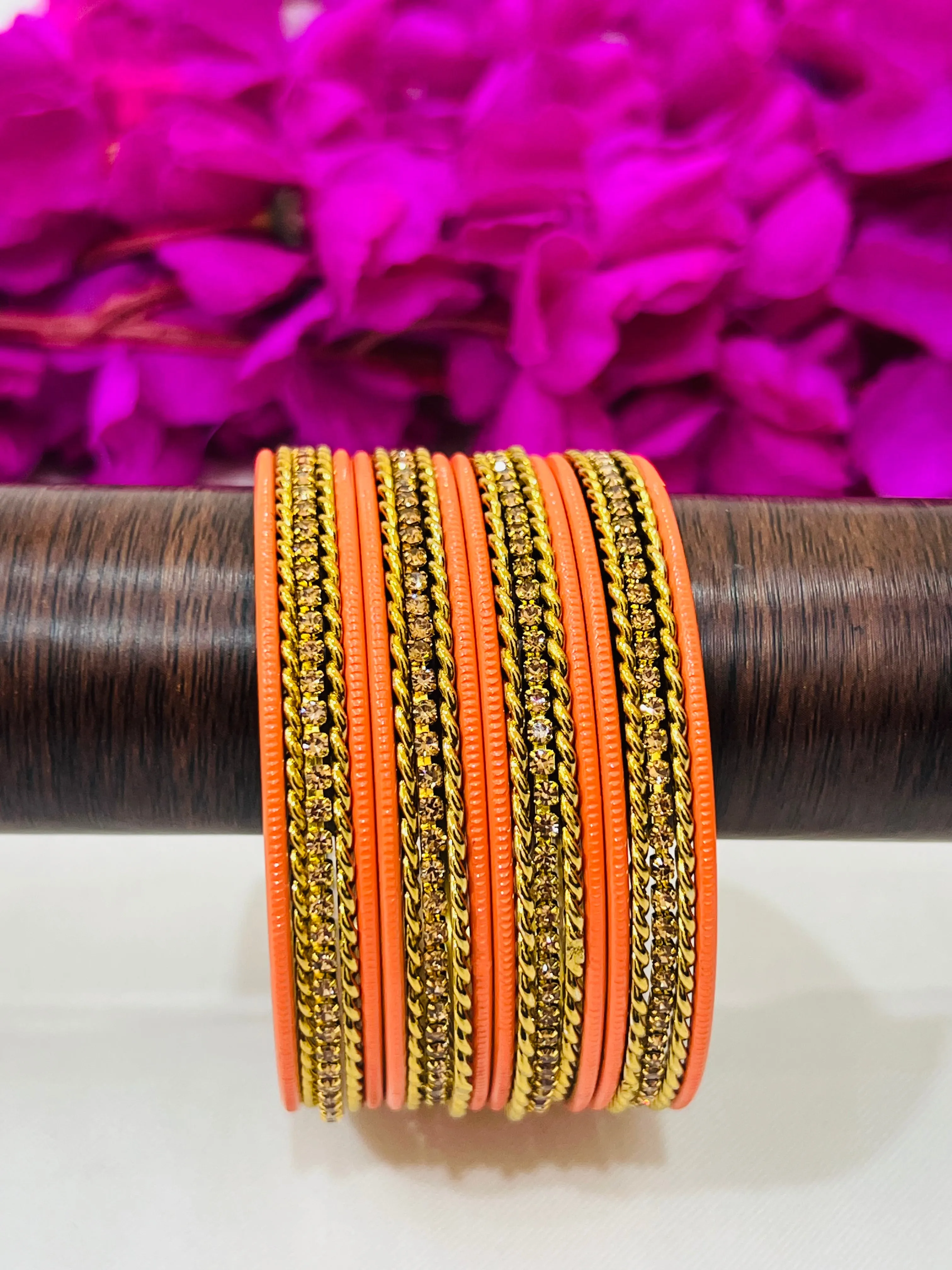 Appealing Orange Color Metal Bangles With Stone Work For Women