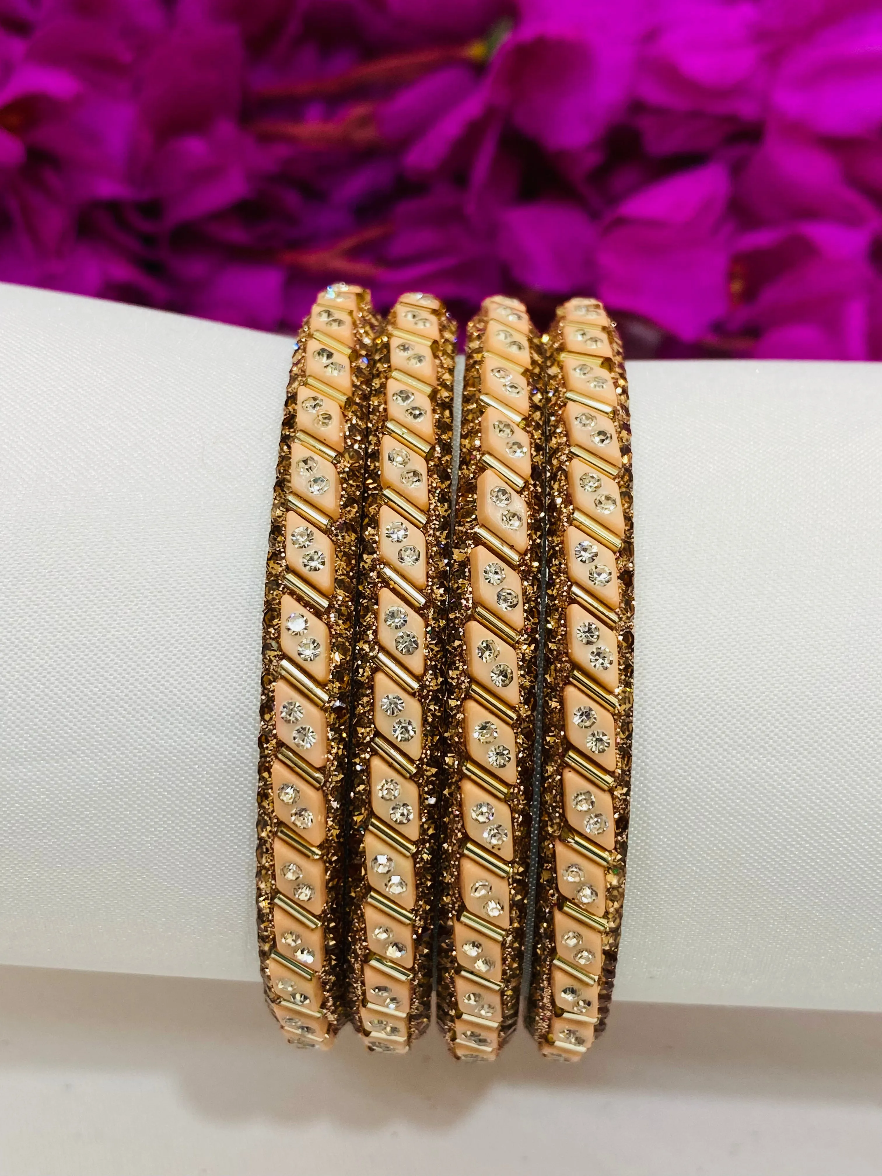 Appealing Peach Color Metal Bangles With Glitter Stone Work For Women