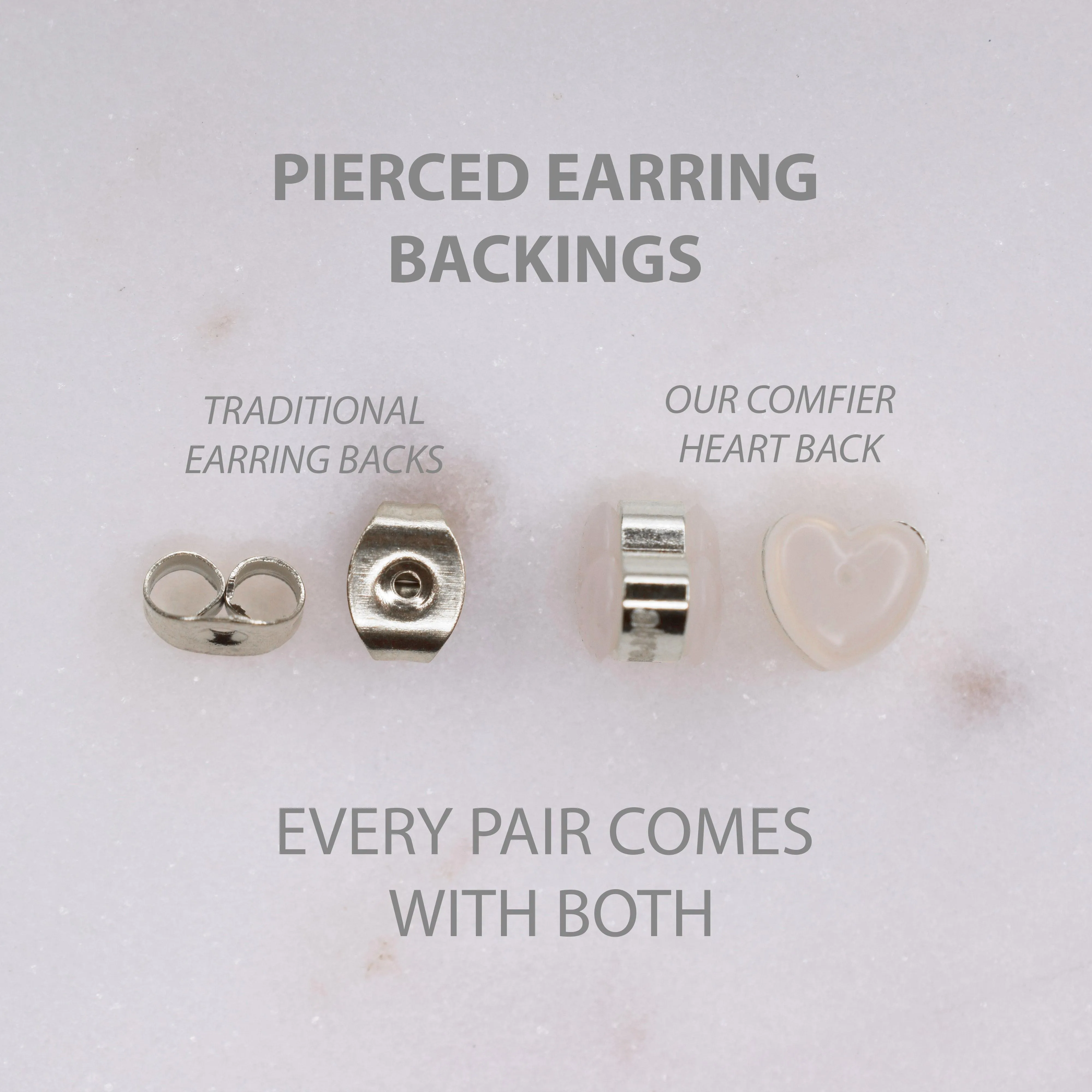 HUGGIE HOOP EARRINGS IN SILVER
